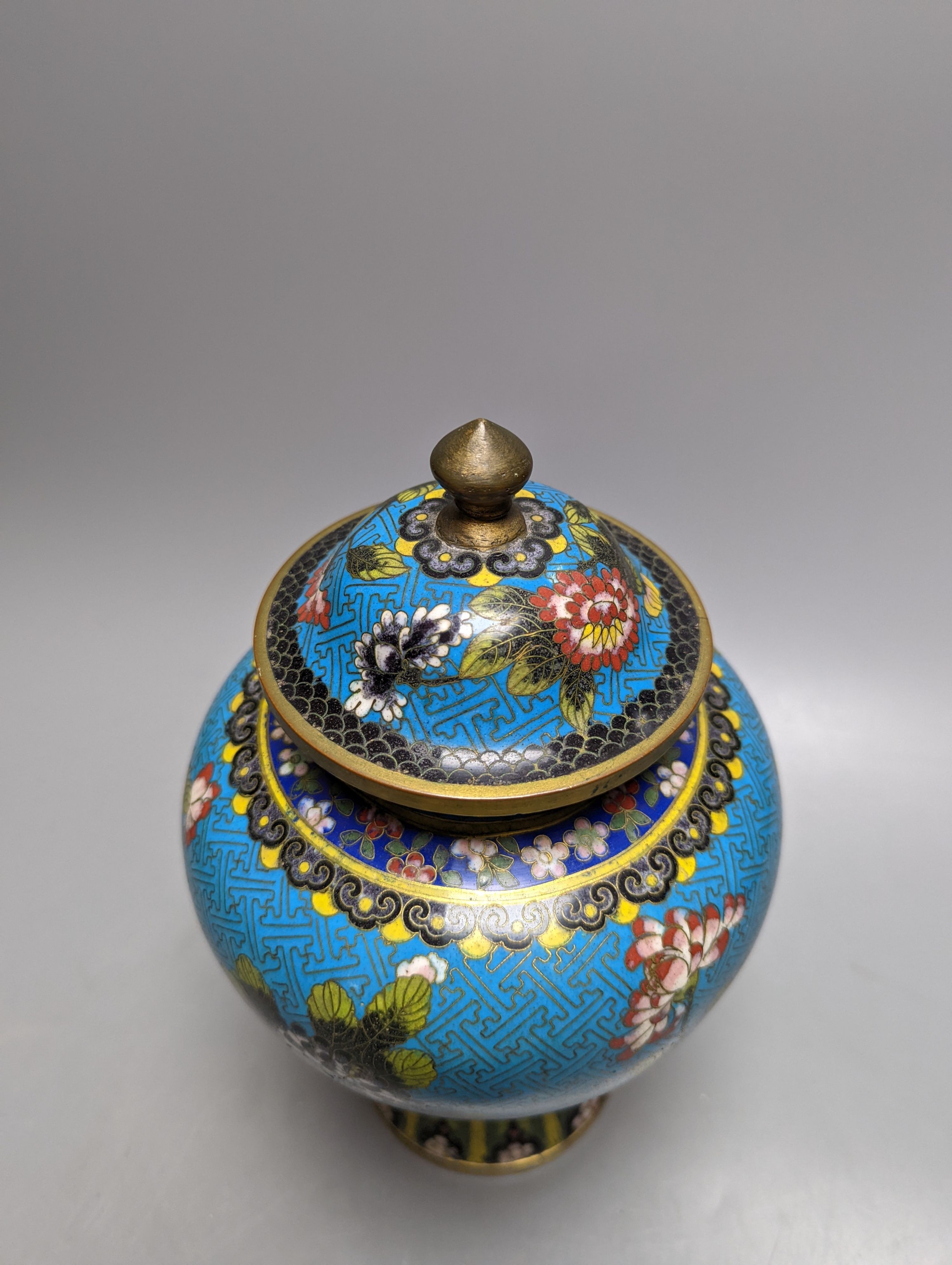 A Chinese cloisonne enamel vase and cover, early 20th century and a bronze brush pot 25cm